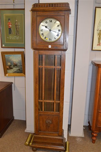 Lot 703 - A longcase clock.