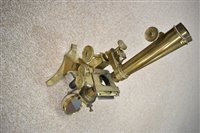 Lot 71 - Brass microscope in mahogany case