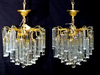 Lot 1060A - A pair of 1970's chandeliers.