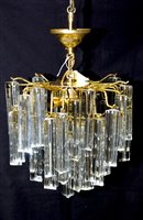 Lot 1060 - A pair of 1970's chandeliers.