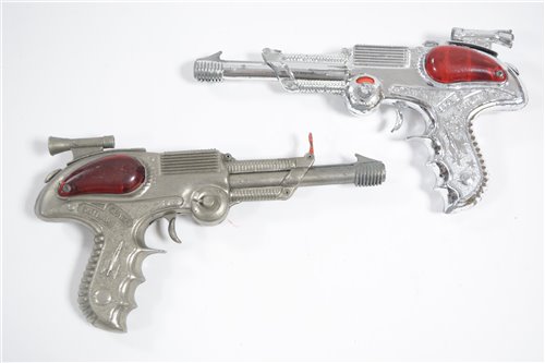 Lot 1550 - Two Lone Star 'Space Outlaw' metal pistols