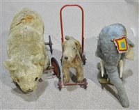 Lot 1603 - Pull along toys and another