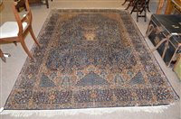 Lot 665 - A Kashan style rug.