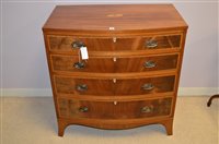 Lot 719 - A bowfront chest of drawers.