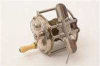 Lot 74 - Two ambidex number one casting reels, and two others