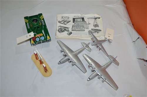Lot 1849 - Three Dinky planes and tin plate tank