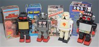 Lot 1038 - Four plastic Robots