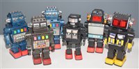 Lot 1040 - Six plastic Robots