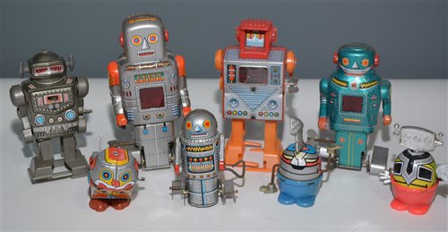 Lot 1053 - Small tin plate robots