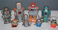 Lot 1053 - Small tin plate robots