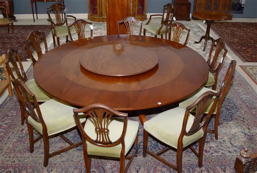 Lot 719 - Chapmans 'Siesta' dining table., cabinet and twelve matching chairs
