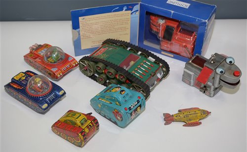 Lot 1090 - Tin plate space vehicles
