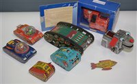 Lot 1090 - Tin plate space vehicles