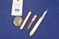 Lot 258 - Gold cased pencil, penknife and a brooch