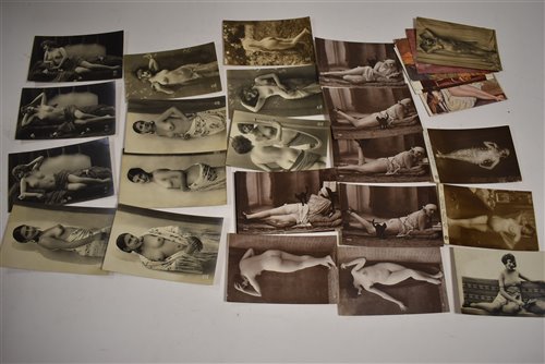 Lot 111 - 29 French risqué postcards