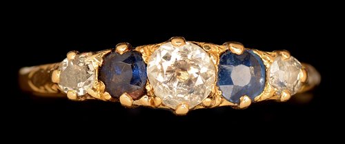 Lot 489 - Sapphire and diamond ring