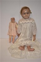 Lot 1185 - Two wax dolls