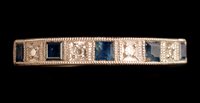 Lot 555 - Sapphire and diamond ring