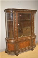 Lot 833 - Carved oak and walnut cabinet