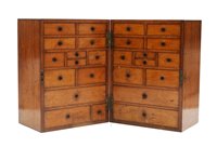 Lot 734 - A 19th Century mahogany small folding cabinet.