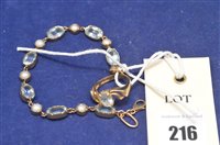 Lot 216 - Aquamarine ring and topaz bracelet
