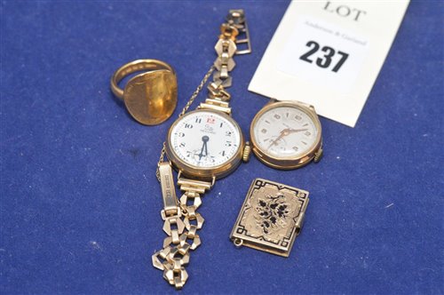 Lot 237 - Gold coin ring, ladies watch, another book locket