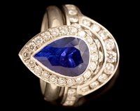 Lot 530 - Tanzanite and diamond ring and matching diamond ring