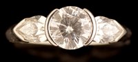 Lot 579 - Three stone diamond ring