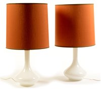 Lot 54 - A pair of mid 20th Century white glass table lamps.