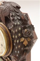 Lot 676 - A rare and unusual Japanese carved mantel clock.