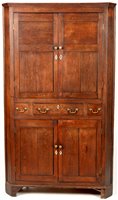 Lot 739 - A Georgian corner cabinet.