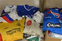 Lot 366 - Two boxes of football shirts.