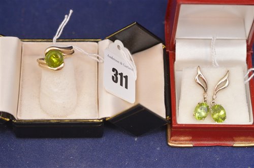 Lot 311 - Peridot ring and earrings