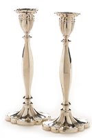 Lot 395 - Pair of silver candlesticks