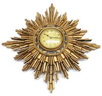 Lot 680 - Japy Freres: a French gold painted sunburst pattern wall timepiece.