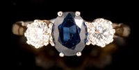 Lot 487 - Sapphire and diamond ring