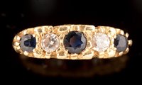 Lot 539 - Five stone sapphire and diamond ring