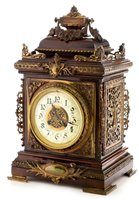 Lot 666 - Marti: an ornate late 19th Century mahogany and gilt bronze bracket clock.