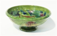 Lot 74 - A William Moorcroft for Liberty 'Claremont' pattern footed bowl.