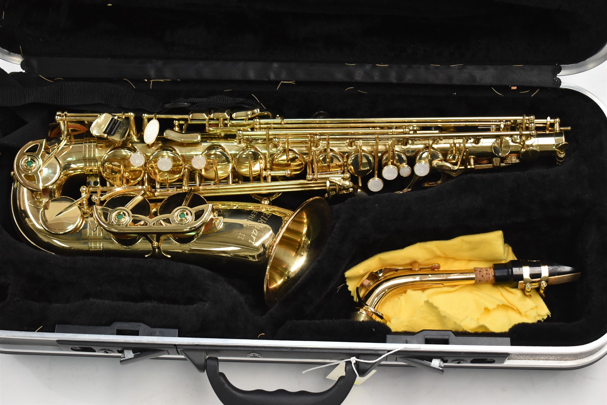Lot 32 Elkhart series II Saxophone Cased