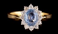 Lot 519 - Sapphire and diamond ring
