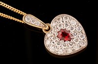 Lot 556 - Ruby and diamond pendant