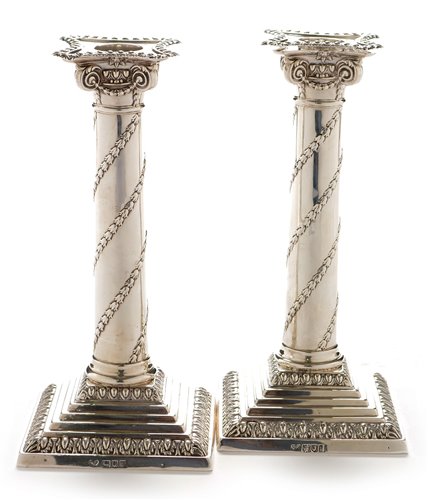 Lot 420 - Pair of silver candlesticks