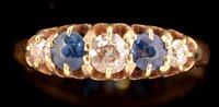 Lot 525 - Sapphire and diamond ring