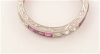 Lot 547 - Ruby and diamond eternity ring