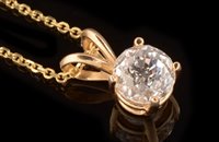 Lot 541 - Diamond pendant and stud earrings