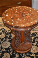 Lot 1190 - A Chinese hardwood circular table.