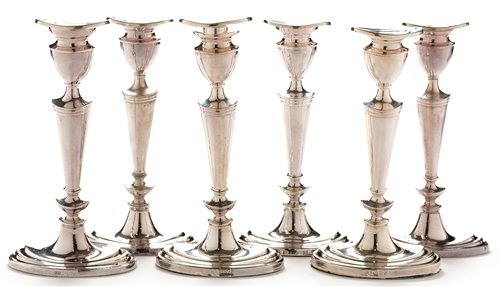 Lot 400 - Composite set of six candlesticks
