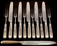 Lot 387 - Knives and forks