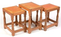 Lot 728 - Robert Thompson of Kilburn: A 'Mouseman' stool; and two matching smaller stools.